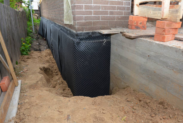 SJ Waterproofing Pros technician performing targeted Basement Waterproofing assessment in Long Valley, NJ